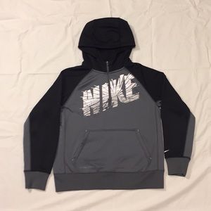 Black, Grey, and White half zip up Nike hoodie